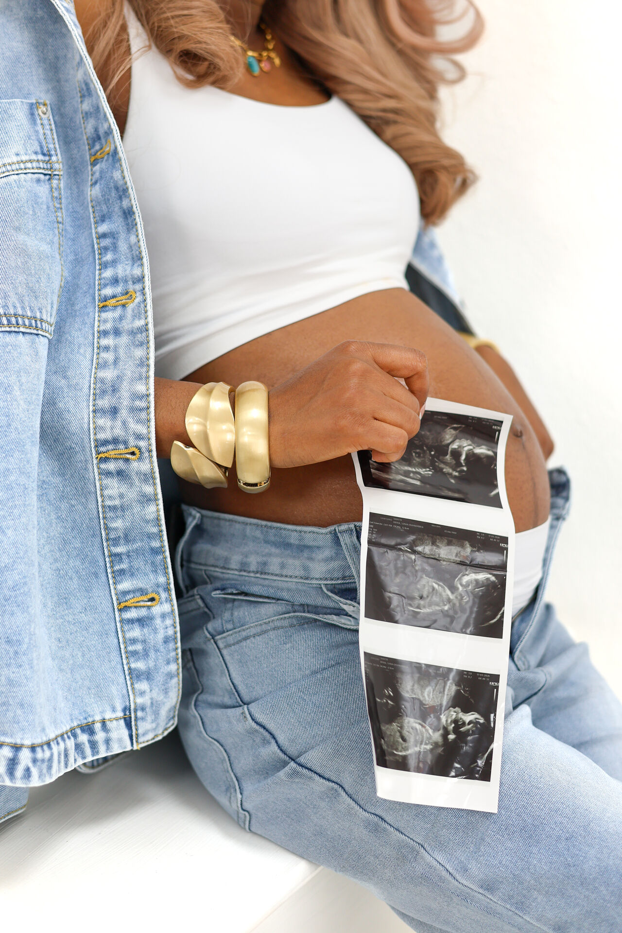 Maternity photoshoot detail with ultrasound scan