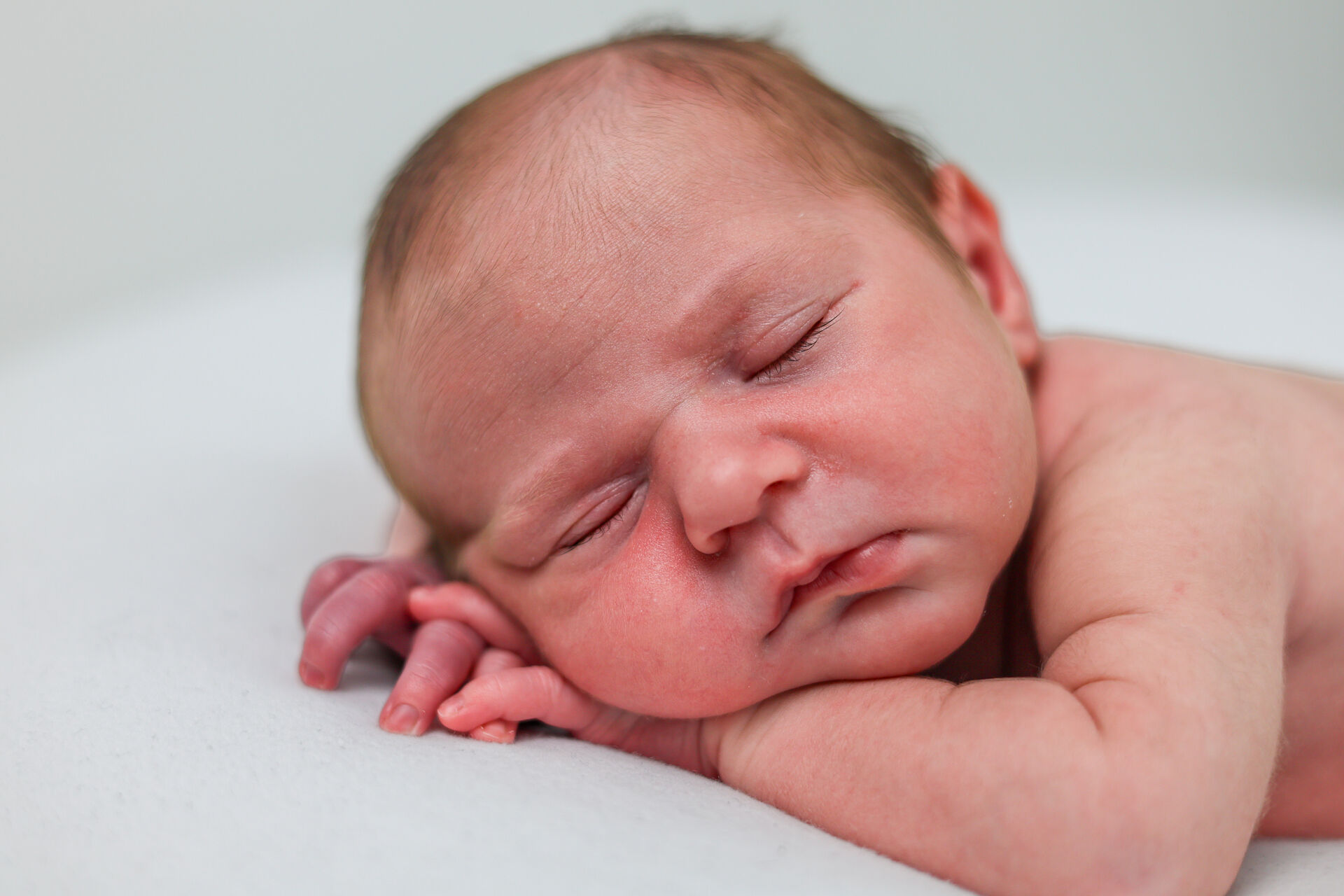 Close-up of sleeping newborn face