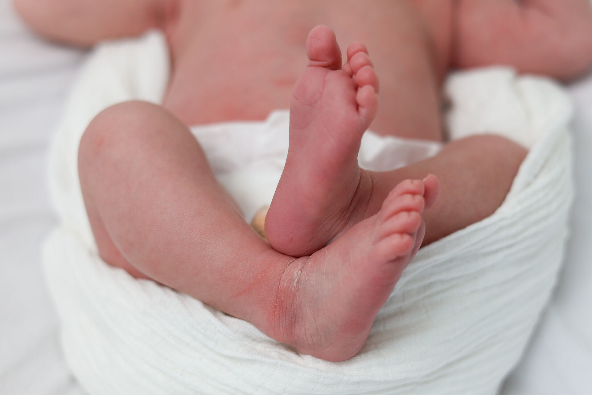 Close-up of newborn baby feet