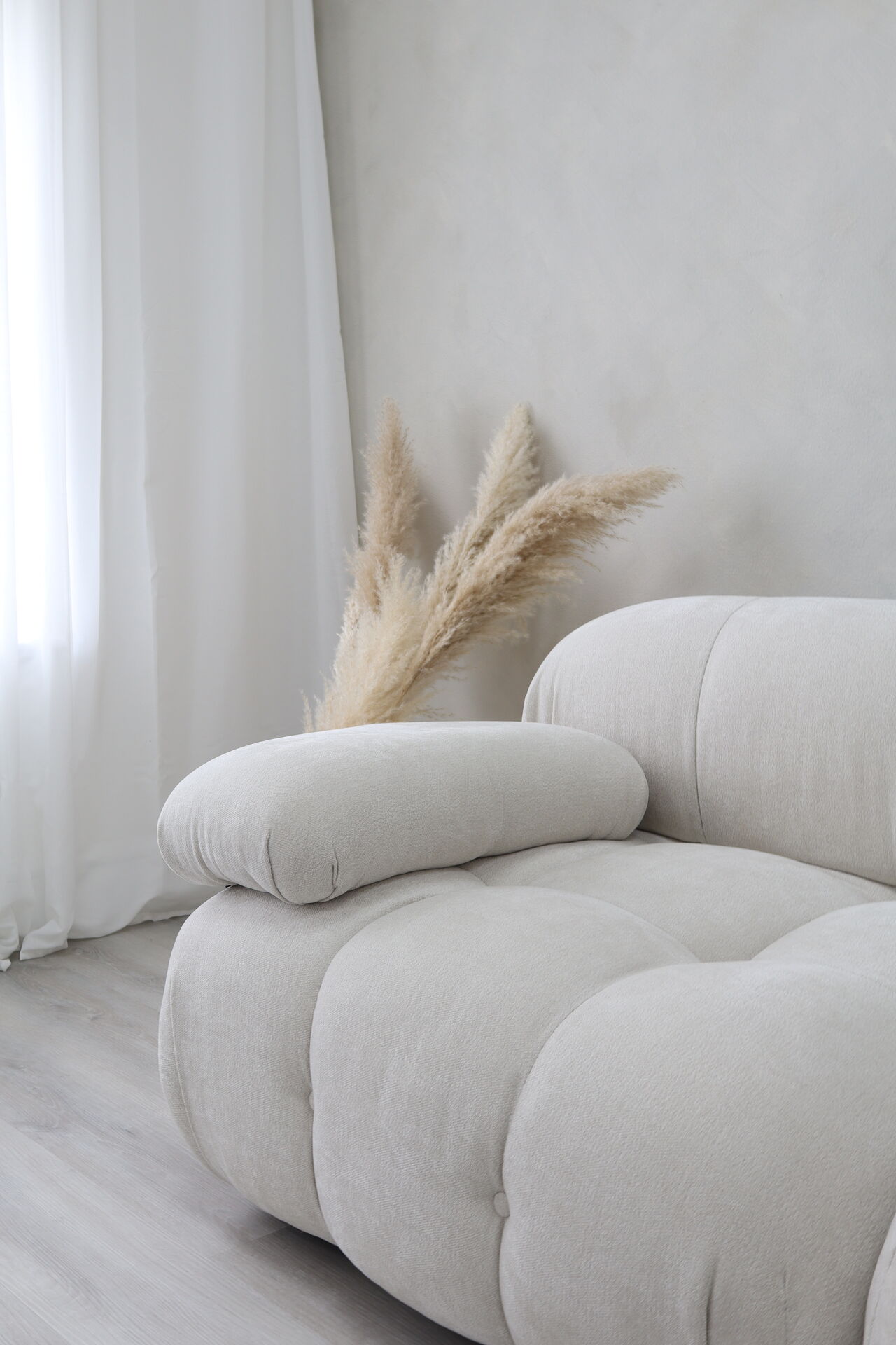 Sofa detail with pampas grass at Cloud Grey Studio